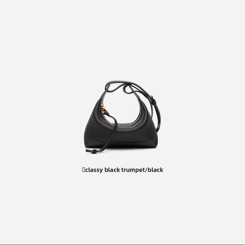 Bolso bandolera de piel · Curvo