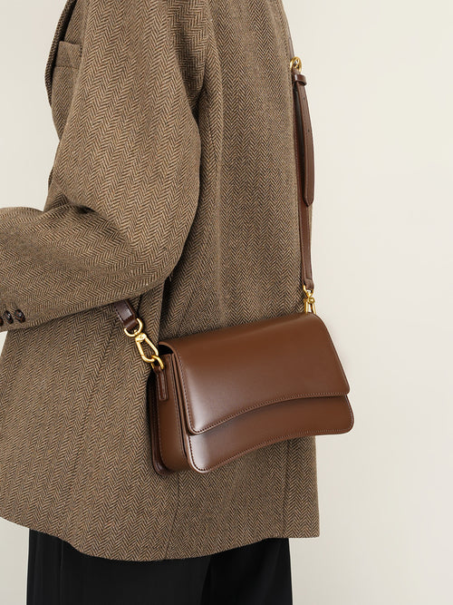 Bolso bandolera de piel compacto