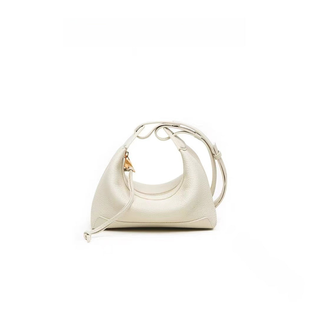 Bolso bandolera de piel · Curvo