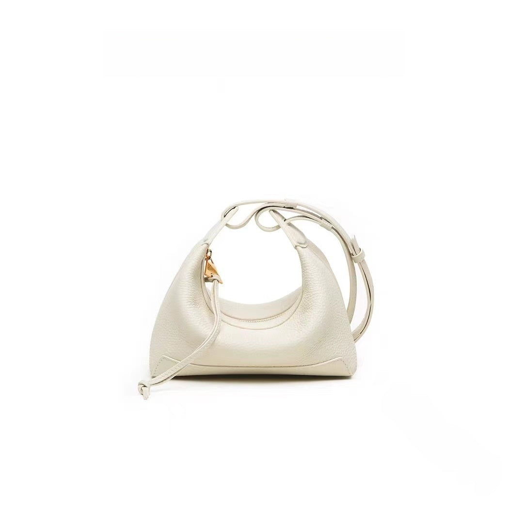 Bolso bandolera de piel · Curvo