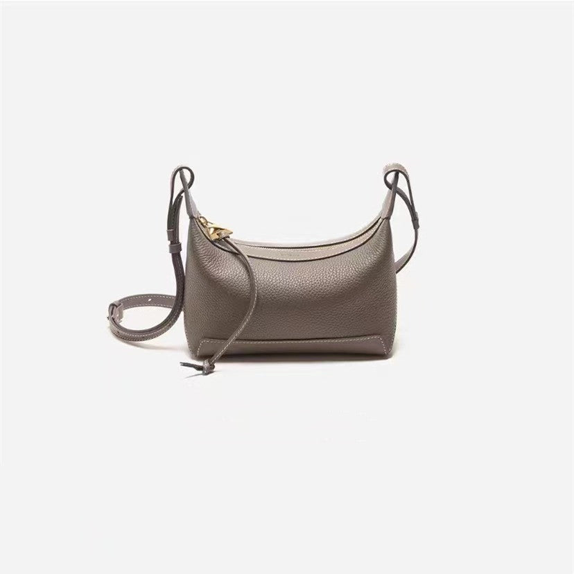 Bolso bandolera de piel · Curvo
