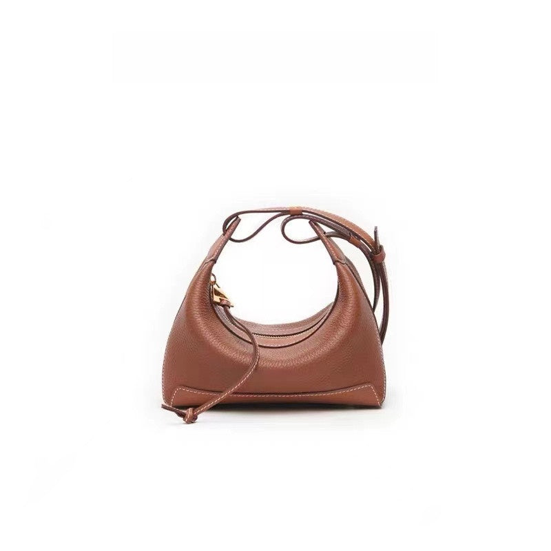 Bolso bandolera de piel · Curvo